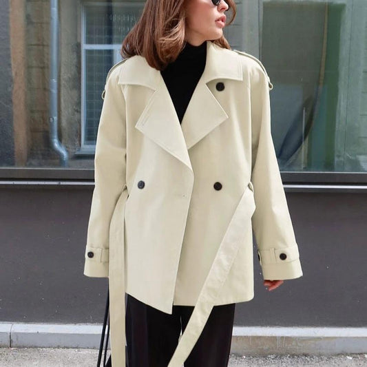 Women's Loose-Fit Trench Coat With Lapel Collar Defined Waist And Belt by GJG Denim