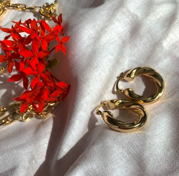 Gold Twist Hoops by Views & Co