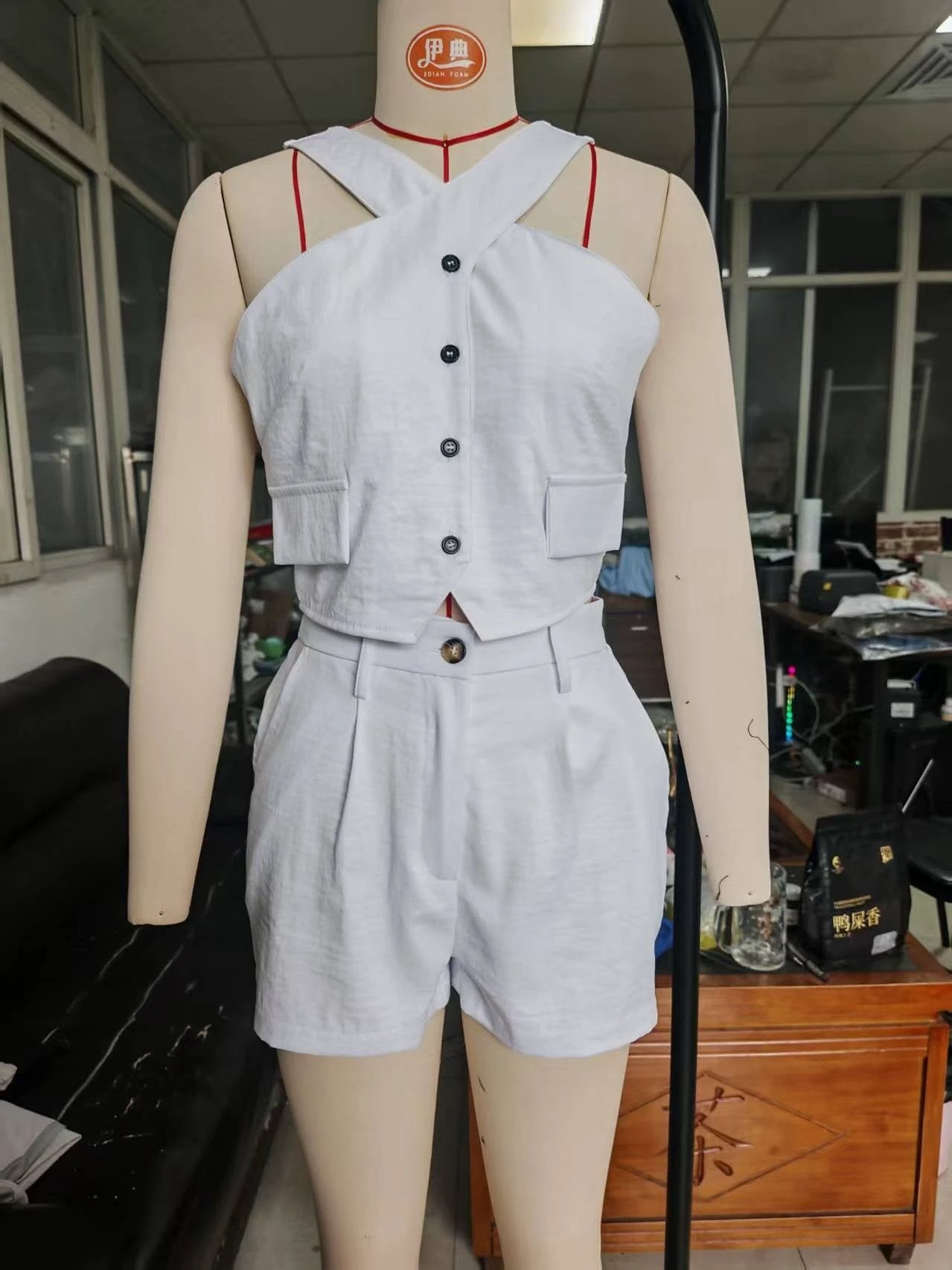 Sleeveless Halter-neck Casual Top Paired With Fashionable Shorts Set by GJG Denim