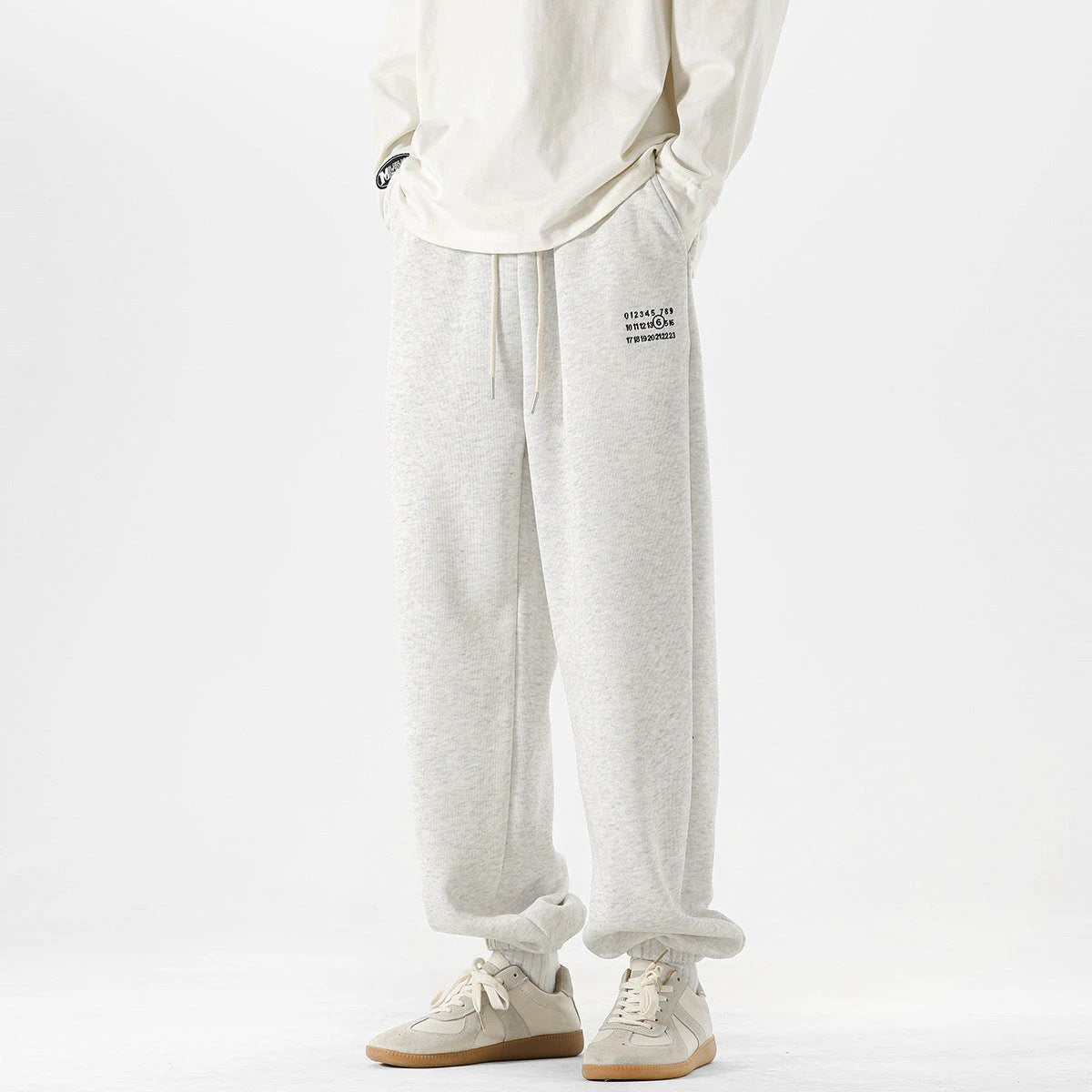 Men's Simple Digital Embroidery Loose Sports Sweatpants by GJG Denim