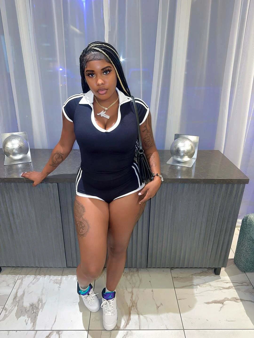 Fashionable Solid-Color U-Neck Short-Sleeve Shirt And Striped Butt-Lifting Shorts Set by GJG Denim