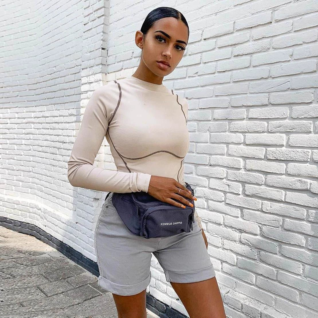 Long sleeve exposed seams bodysuit by GJG Denim