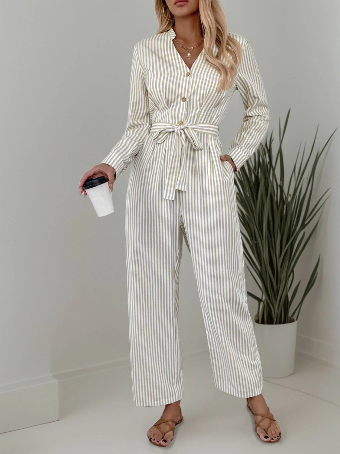 Striped Notched Long Sleeve Tie Waist Jumpsuit by Lady Ros