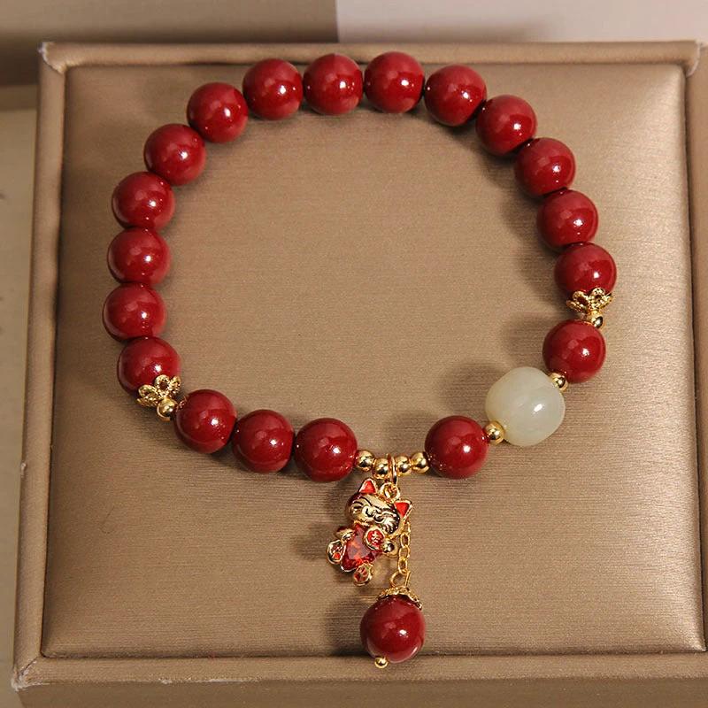 Cinnabar Beaded Lucky Cat Pendant Bracelet by GJG Denim
