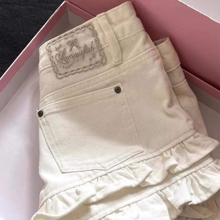 White Ruffled Panel Denim Shorts by GJG Denim