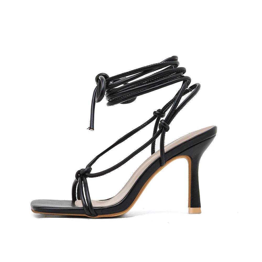 Lace-up stiletto heels by GJG Denim