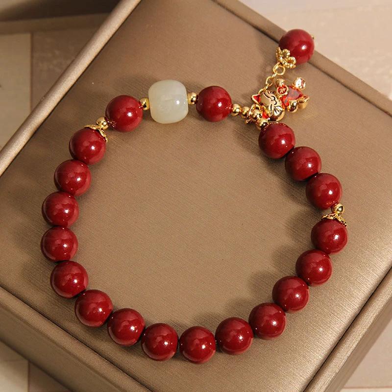 Cinnabar Beaded Lucky Cat Pendant Bracelet by GJG Denim