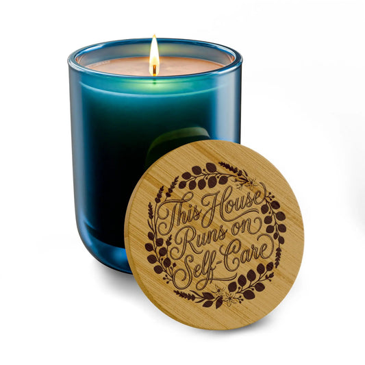 Engraved Soy Candle - "This House Runs on Self-Care" 14oz Scented Candle with Bamboo Lid by Printify