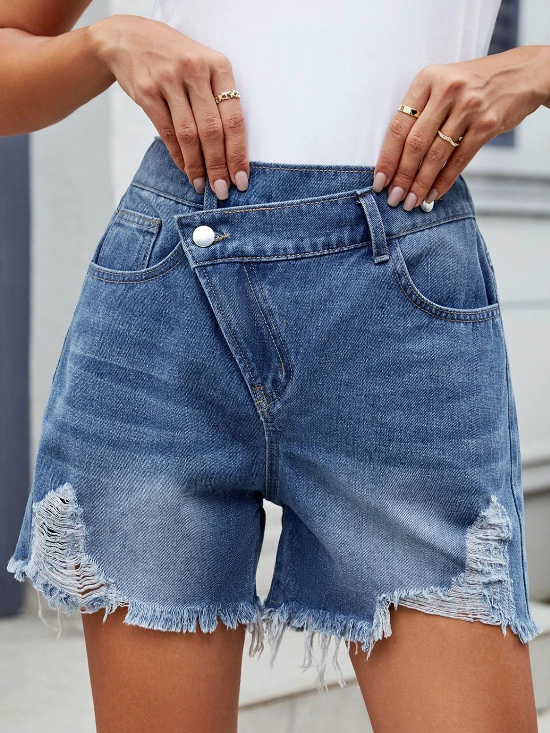 Distressed Raw Hem Asymmetrical Waist Denim Shorts by Lady Ros