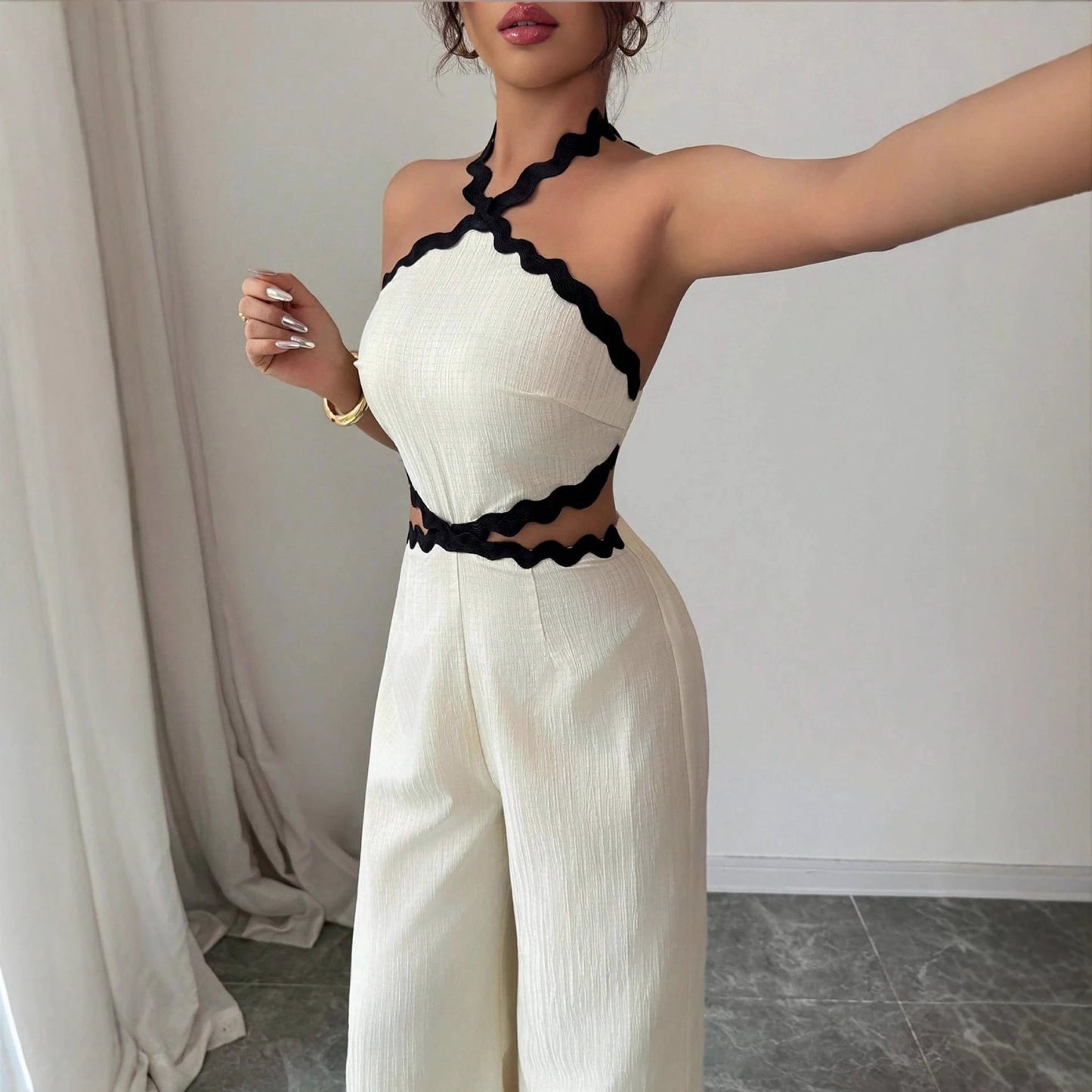 Women's Fashionable Wave Lace Texture Halter Stitching Hollow-out Jumpsuit by GJG Denim