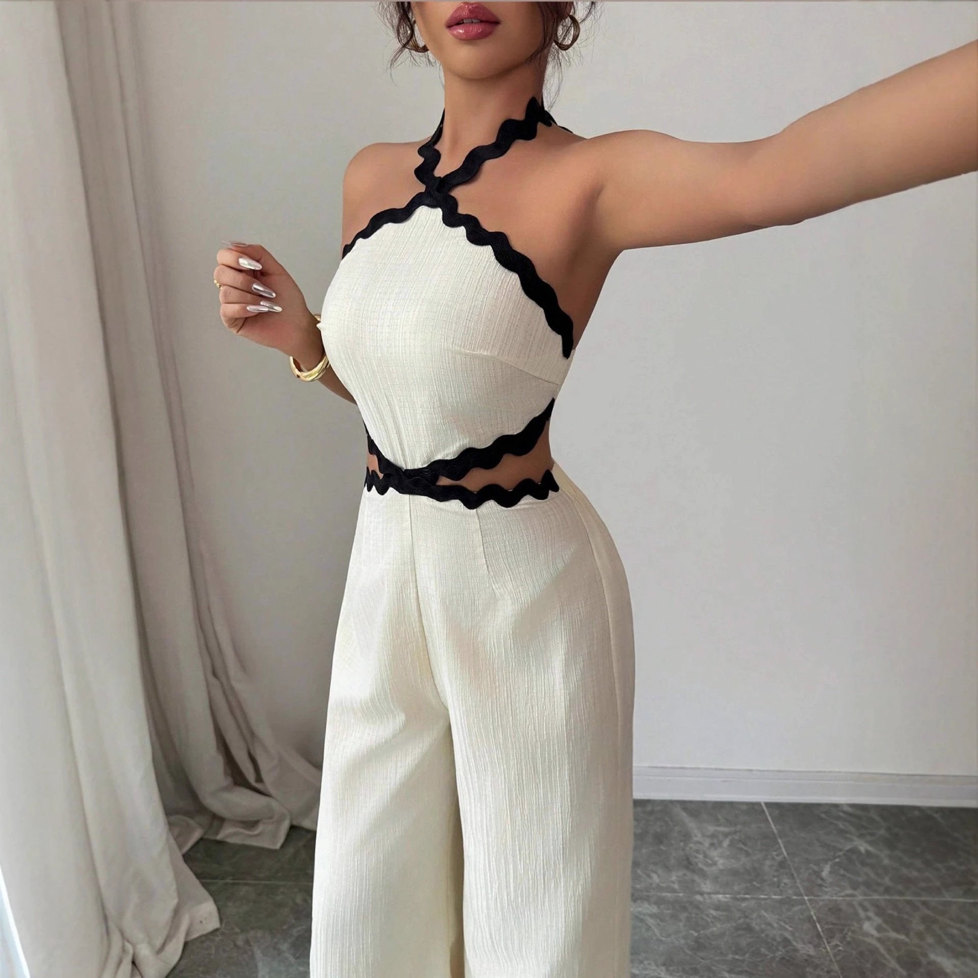 Women's Fashionable Wave Lace Texture Halter Stitching Hollow-out Jumpsuit by GJG Denim
