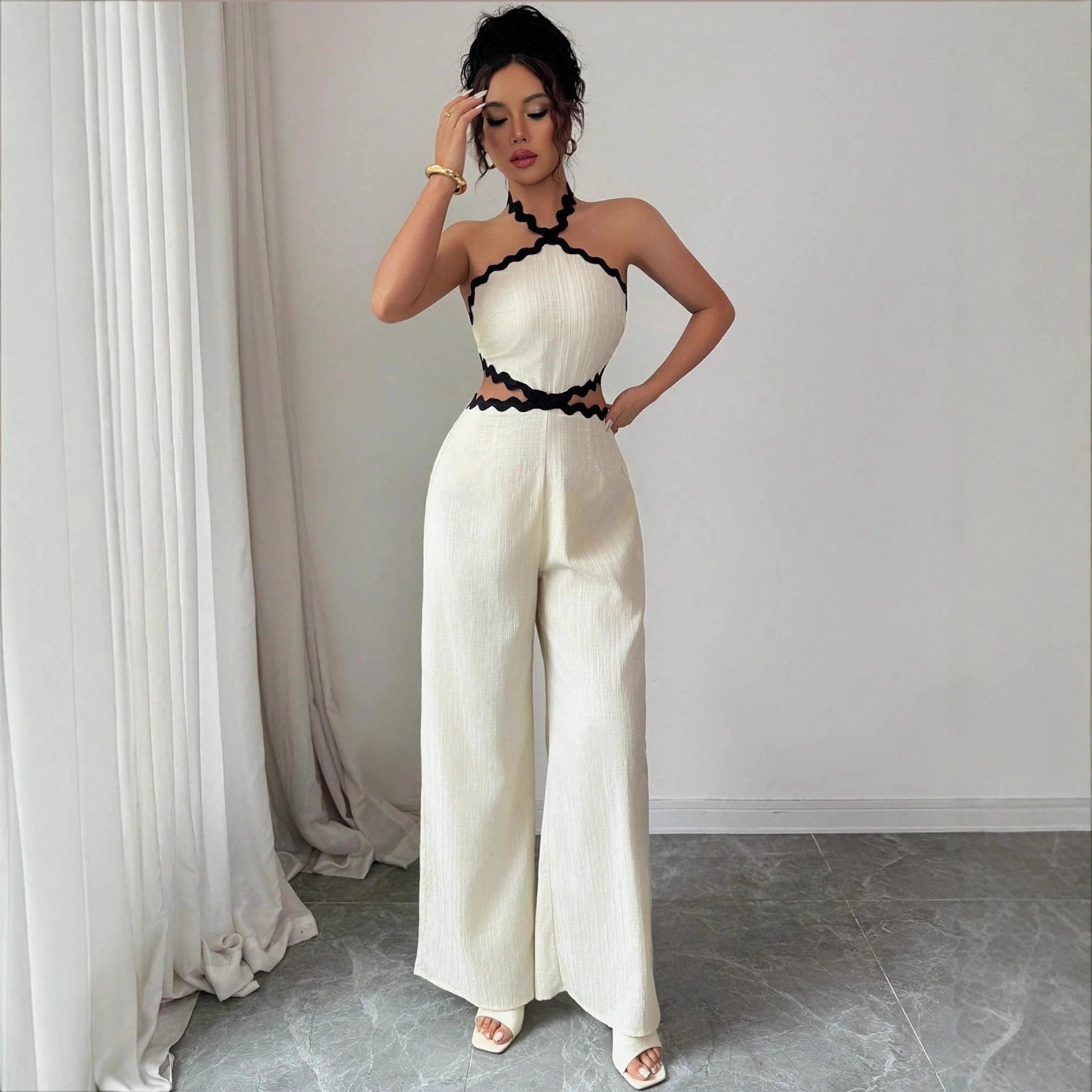 Women's Fashionable Wave Lace Texture Halter Stitching Hollow-out Jumpsuit by GJG Denim