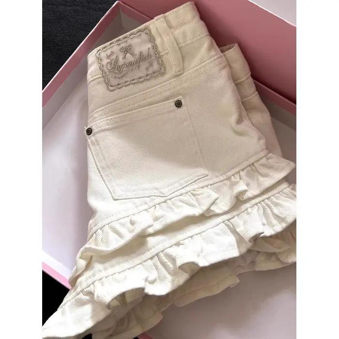 White Ruffled Panel Denim Shorts by GJG Denim