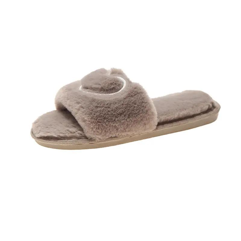 Plush slippers for women by GJG Denim