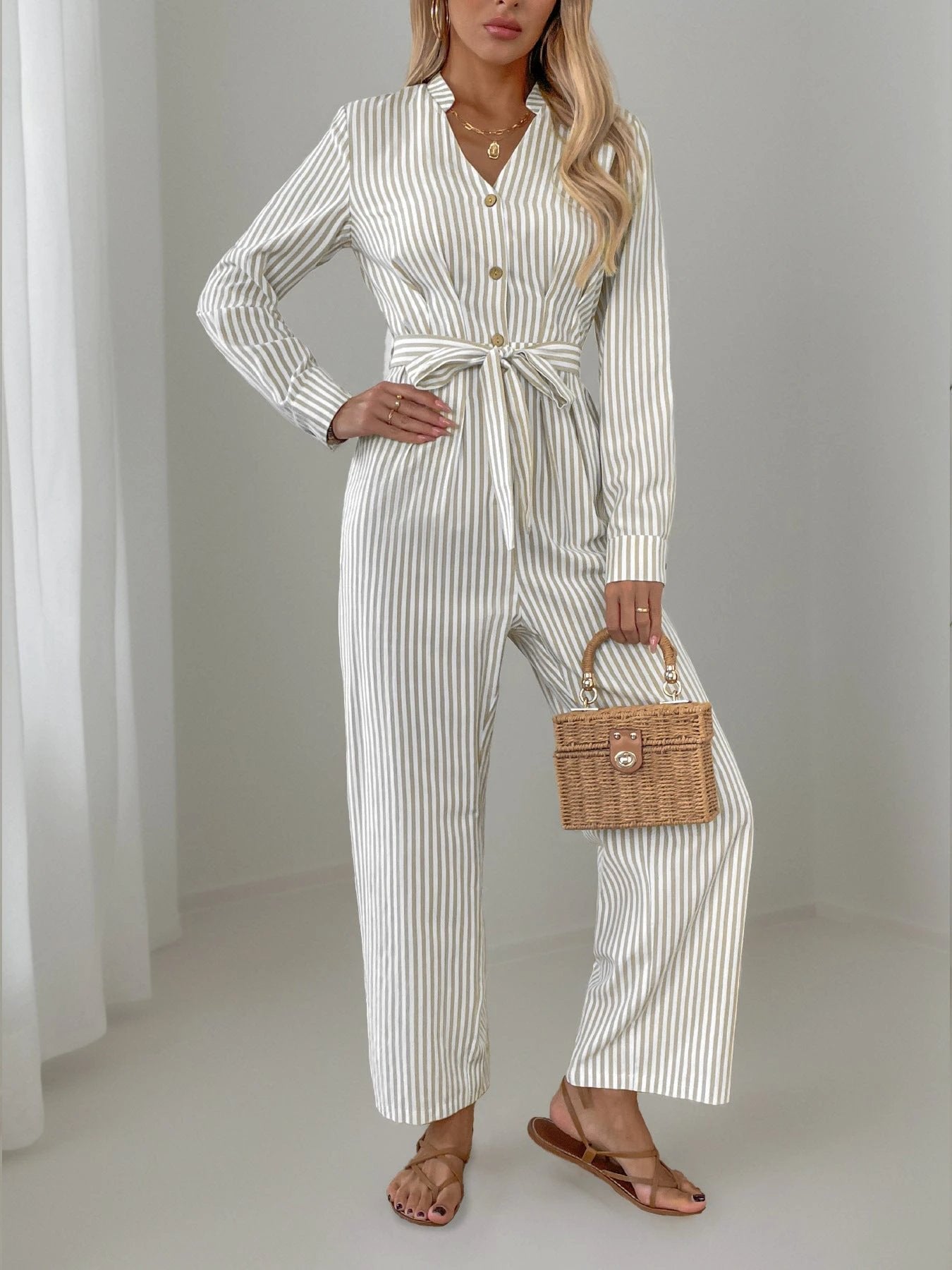 Striped Notched Long Sleeve Tie Waist Jumpsuit by Lady Ros