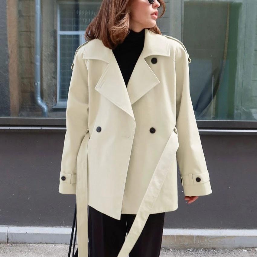 Women's Loose-Fit Trench Coat With Lapel Collar Defined Waist And Belt by GJG Denim