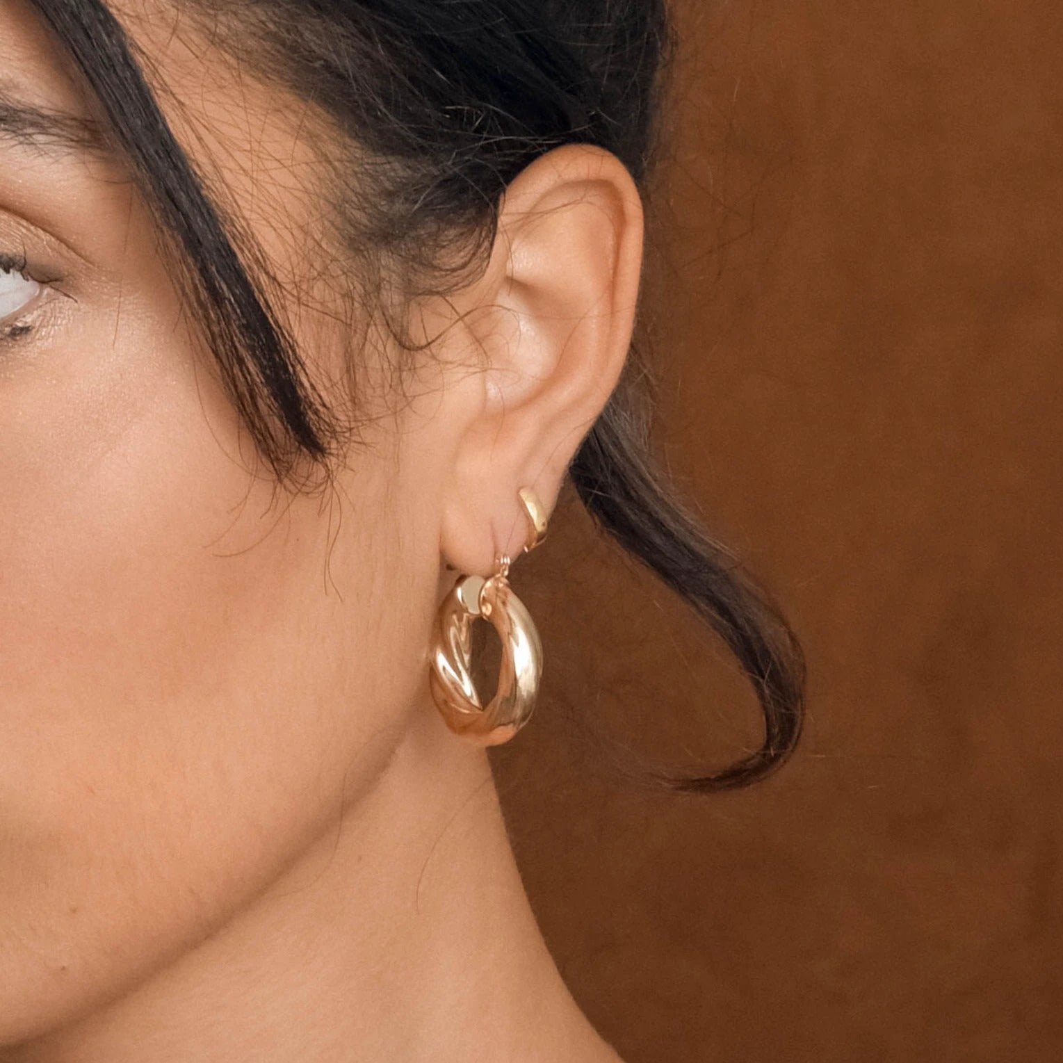 Gold Twist Hoops by Views & Co
