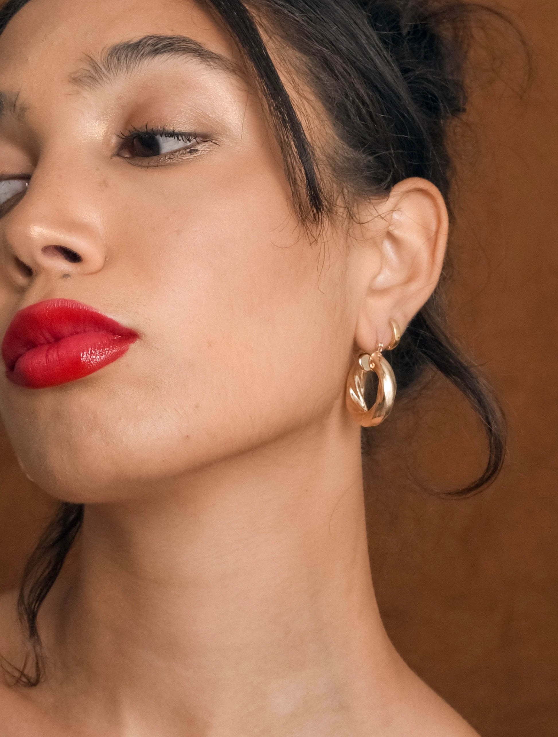 Gold Twist Hoops by Views & Co