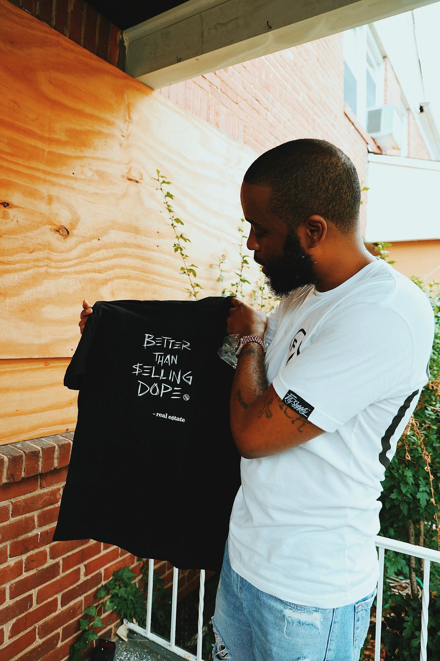 Better Than Selling Dope - Real Estate (Black Tee) by Fly Supply Co