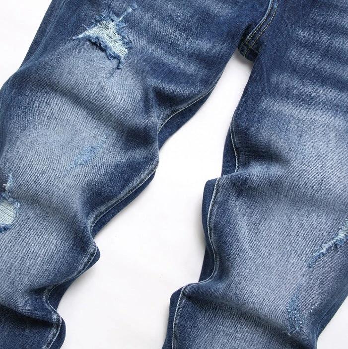 Fashionable Trendy Men's Slim-fit Denim Jeans With A Distressed Design by GJG Denim