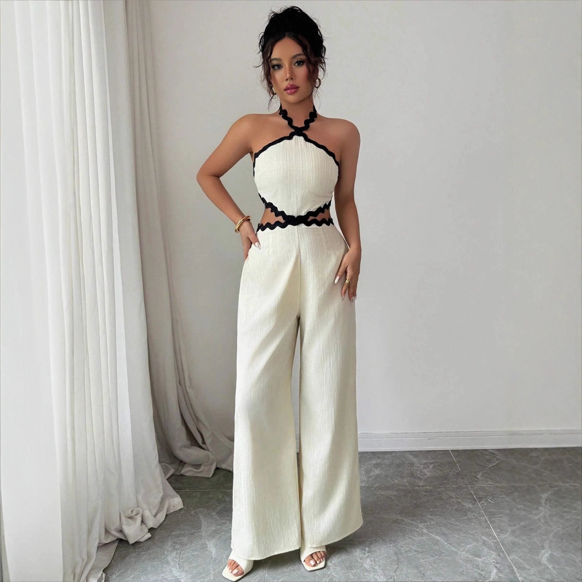 Women's Fashionable Wave Lace Texture Halter Stitching Hollow-out Jumpsuit by GJG Denim