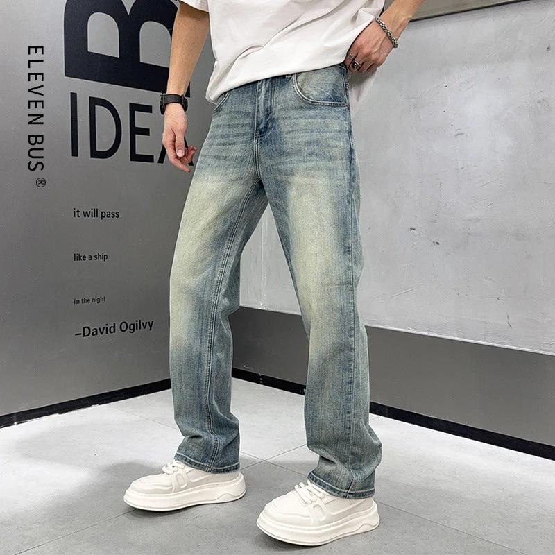 Men's Loose Elastic Casual Light Blue Jeans by GJG Denim