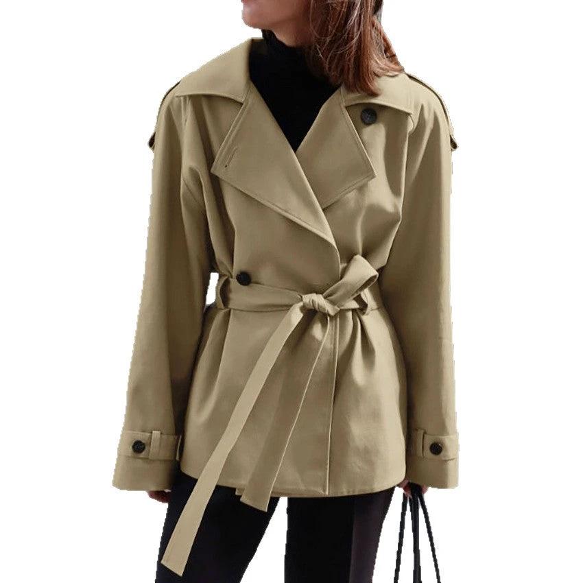 Women's Loose-Fit Trench Coat With Lapel Collar Defined Waist And Belt by GJG Denim